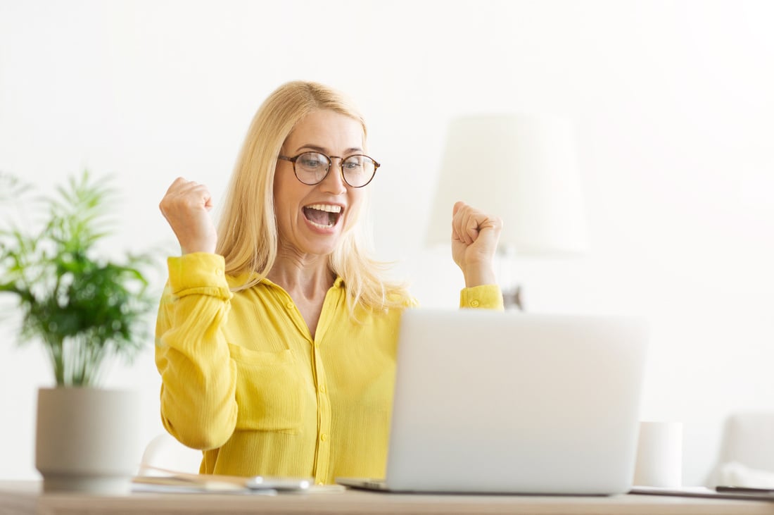 Great Result. Overjoyed Mature Woman Celebrating Success